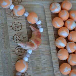 Colier portocaliu cu prăjituri - Imagine 6