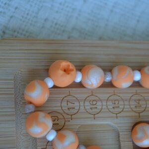 Colier portocaliu cu prăjituri - Imagine 7