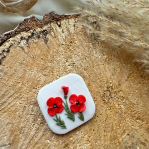 Broșă flori de primăvară roșii 1