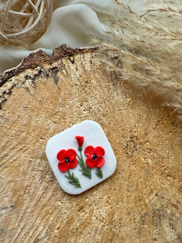 Broșă flori de primăvară roșii 1